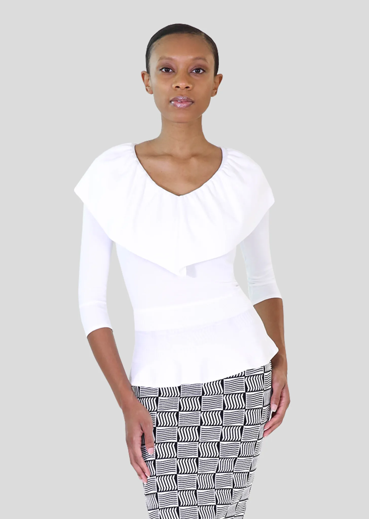Loraina - Milano Knit Ruffle Neckline Peplum Top